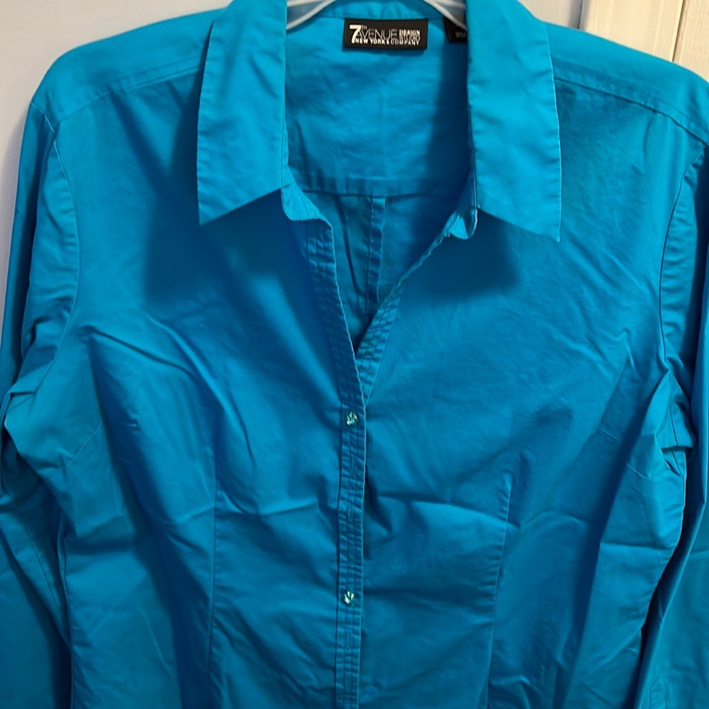 Beautiful blue button down top.